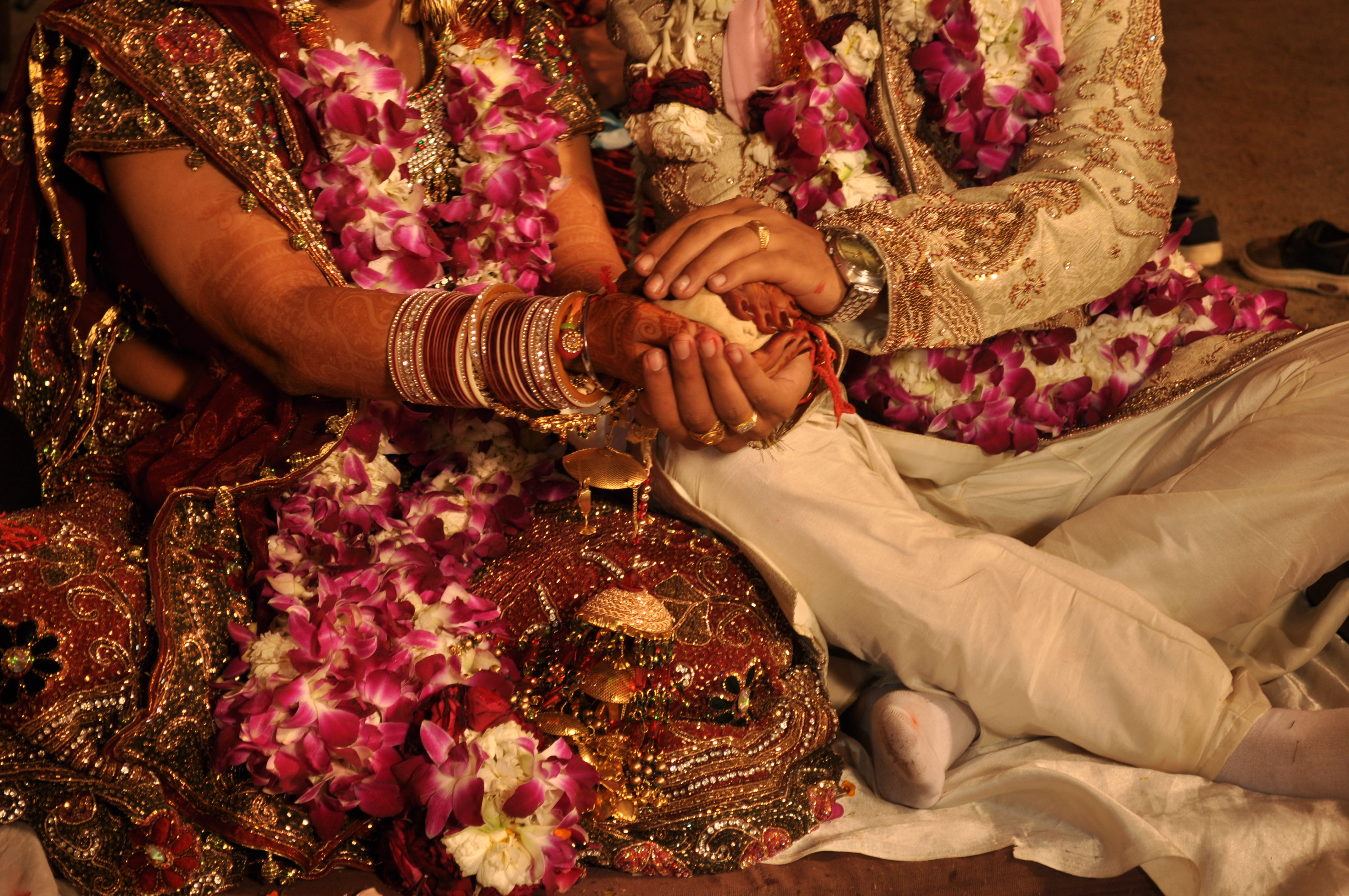 Hindu Weddings of Northern India bride and groom with festive Saris