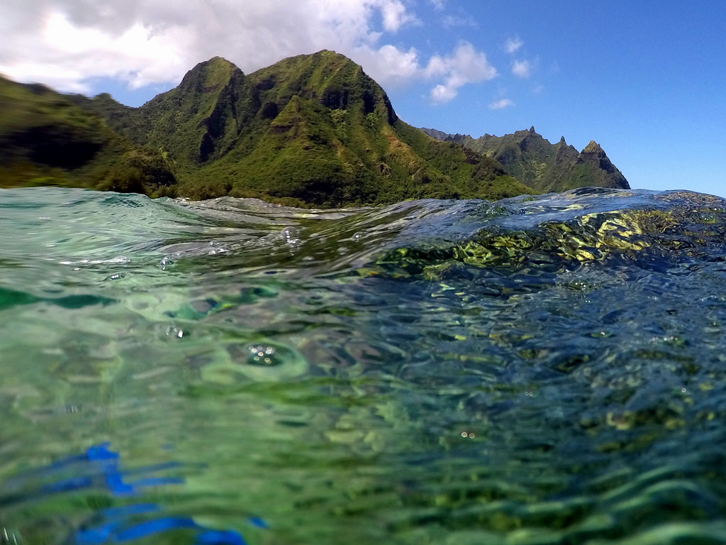 Crystal clear water and green Hawaiian hills the perfect getaway to warmer climes