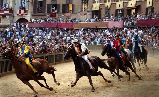 Palio di Siena festival of Il Palio bareback horse riders in Italy