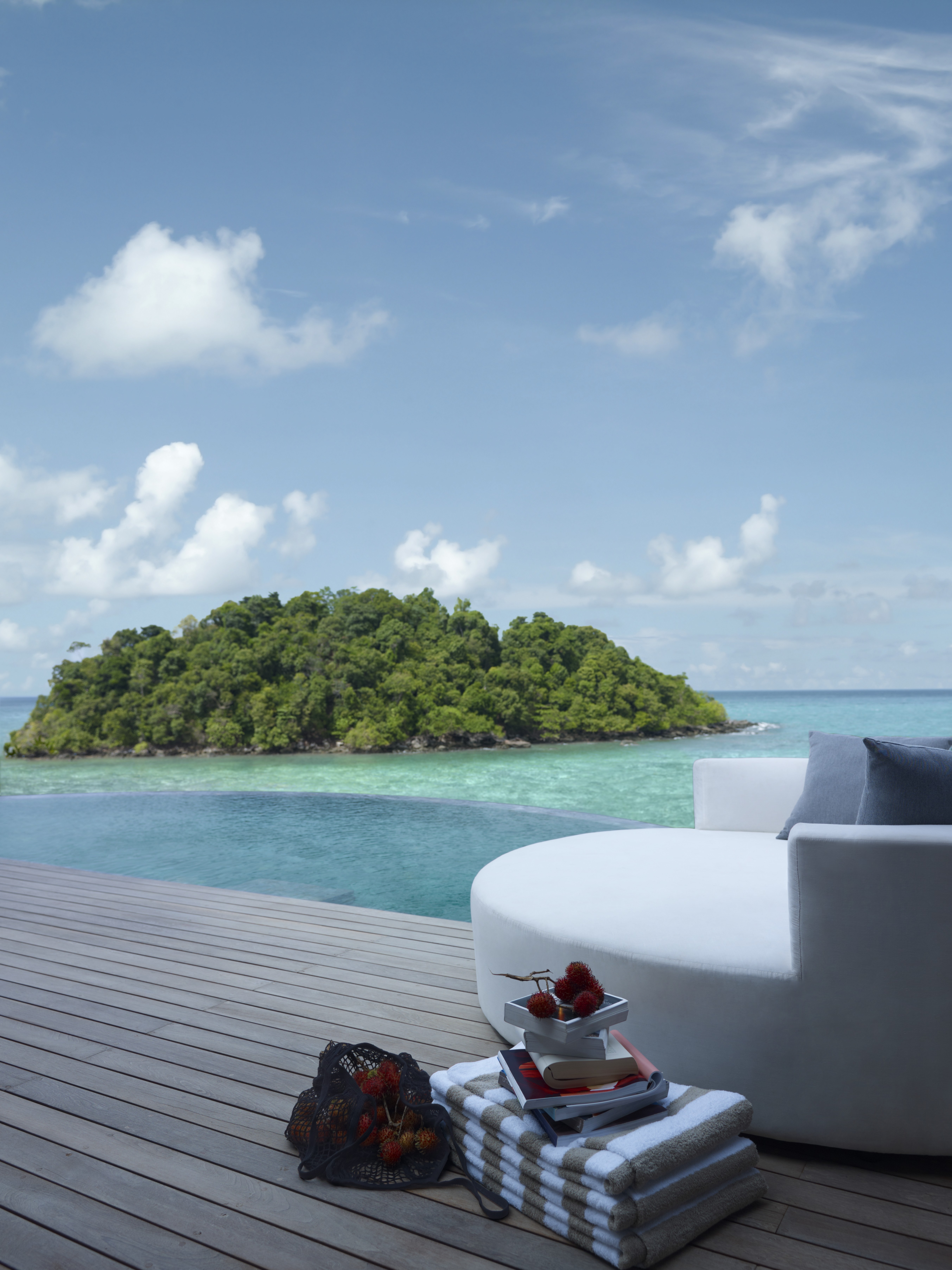View from wooden terrace on turquoise ocean and southern islands