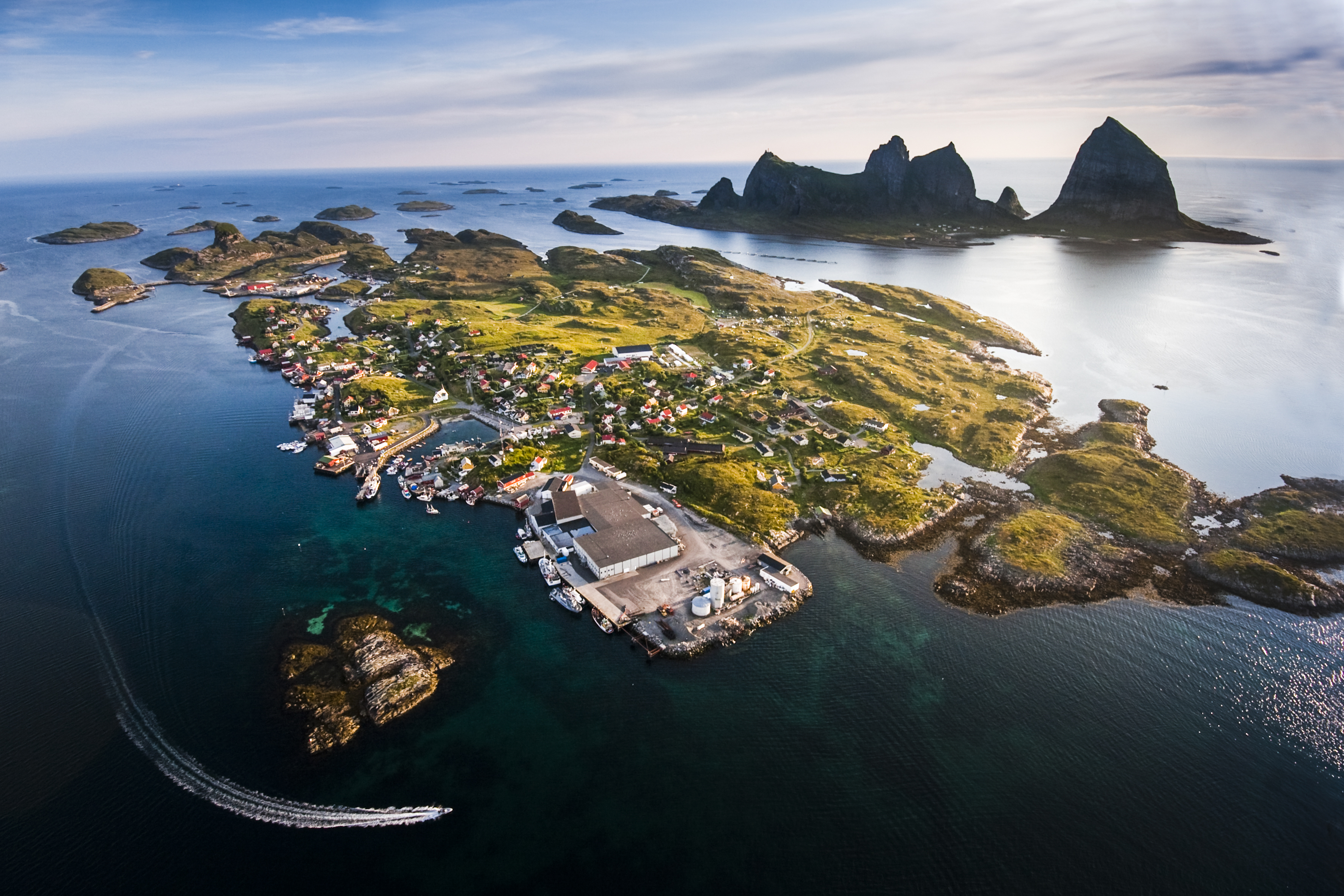 Aerial shot of little islands surrounded by crystal clear water remote and luxury island retreats all over the world