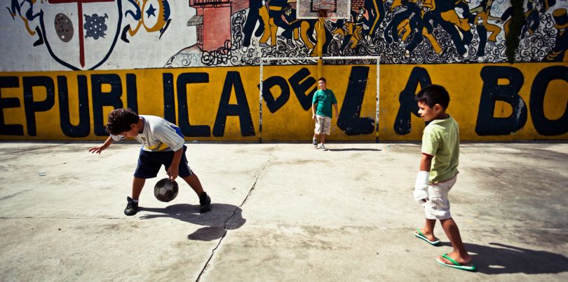 Children playing football in the streets of La Boca, Argentina