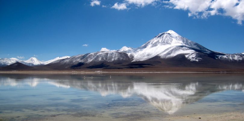 The White Lagoon in the Atacama desert with snowy mountains in Uyuni Bolivia