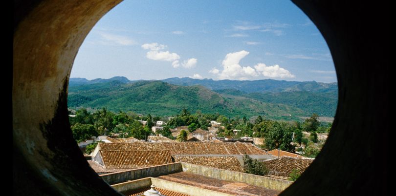 View through circular window on Cuban landscape