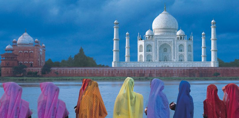 Indian women looking over the Taj Mahal, Agra, India