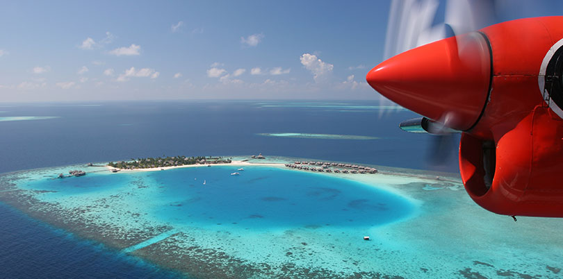 View down on Maldive islands from plane