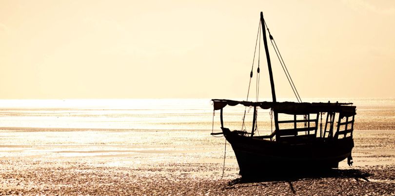 Silouette of a boat on the beach, Mozambique