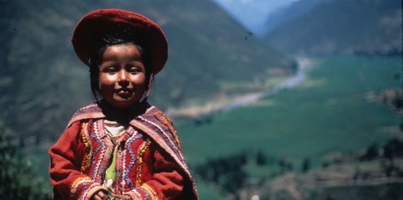 Little girl dressed in traditional Peruvian garment