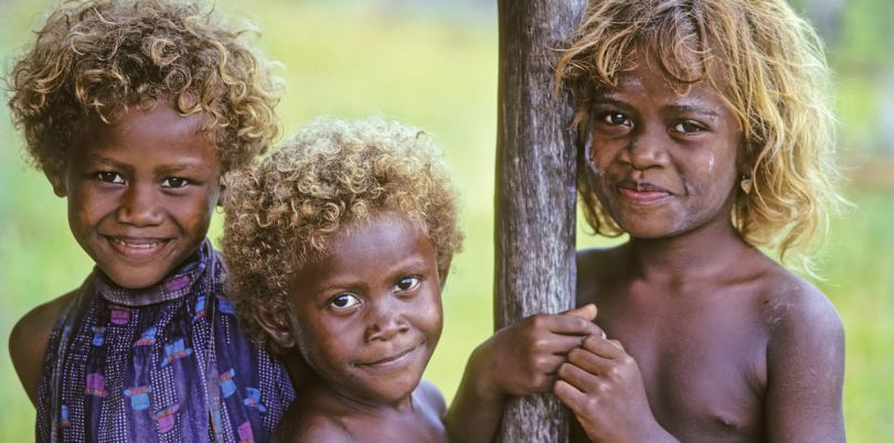 Children with sun bleached hair from the Solomon Islands