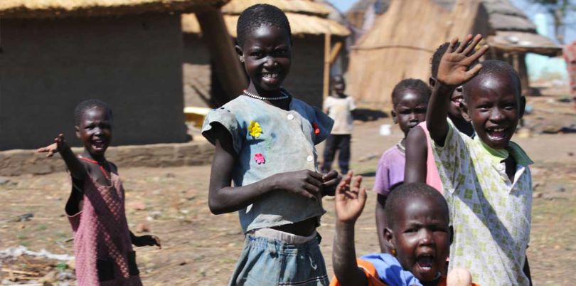 Waving children in South Sudan