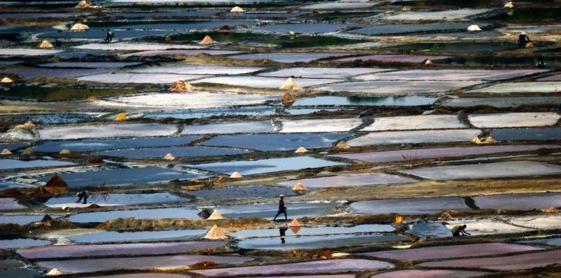 Person walking across the salt planes in Uganda